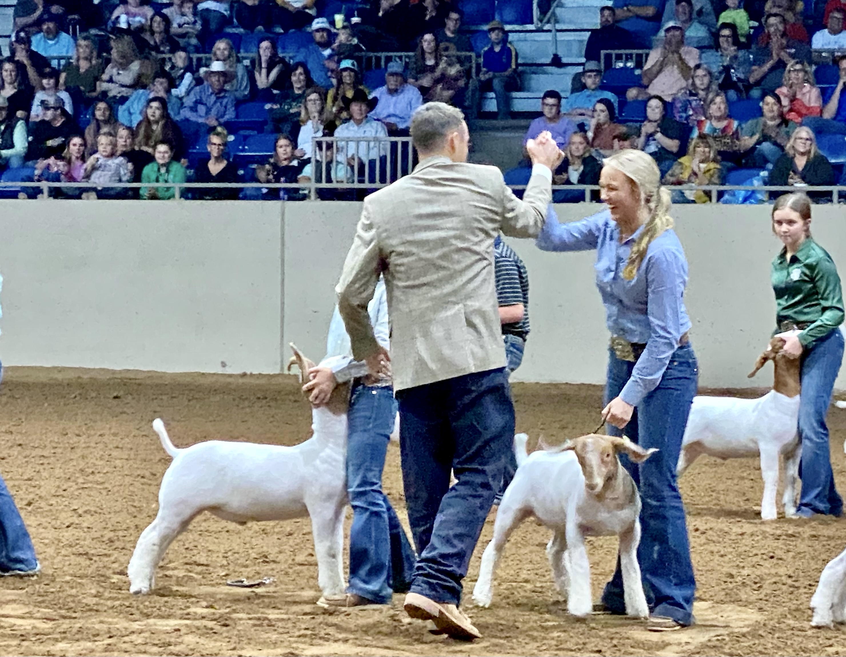 Cara Cummings of Hollis FFA Shows Grand Champion Market Goat at 2021 Tulsa State Fair