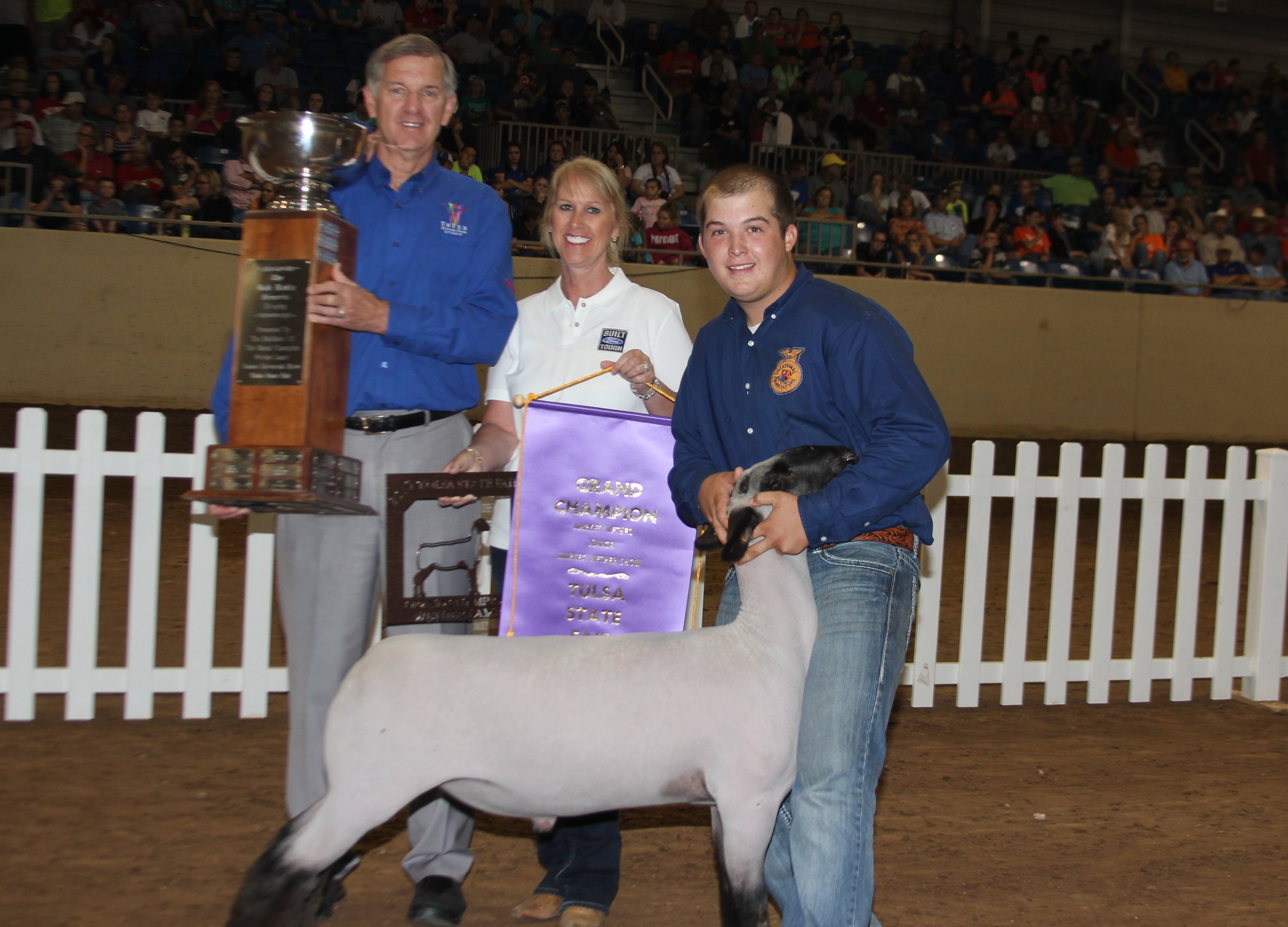 Tyler Rhoads of Indiahoma FFA Shows Grand Champion Market Lamb at Tulsa State Fair