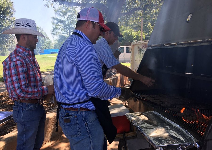 Beef Day at the Capitol Finds Hamburgers Being Served With a Big Smile
