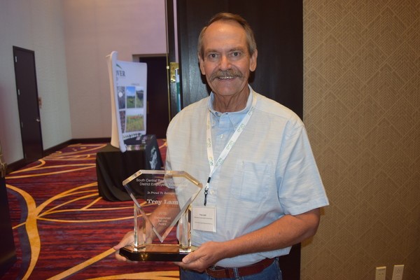 Trey Lam receives the South Central Region Conservation District Employees Association 2019 Distinguished Service Award